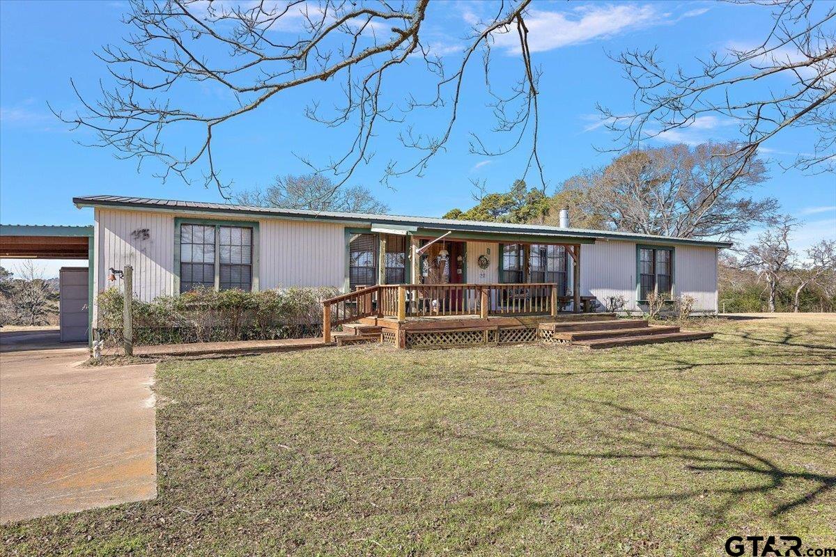 304 County Road 2206 Rusk, TX 75785 - Photo 9 of 27 a view of swimming pool with outdoor seating