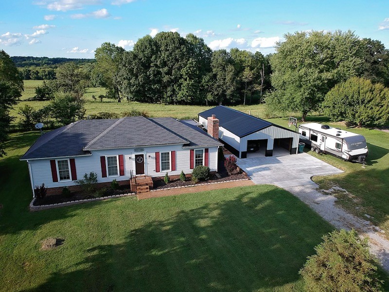 6360 Gum Station Road Springfield, TN 37172 - Photo 1 of 4 a aerial view of a house with garden