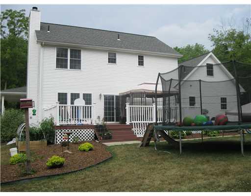 132 McCall Road Butler, PA 16001 - Photo 13 of 18 Exterior Back. Trex deck,bonus room over the garage, work shop area in the over sized garage.