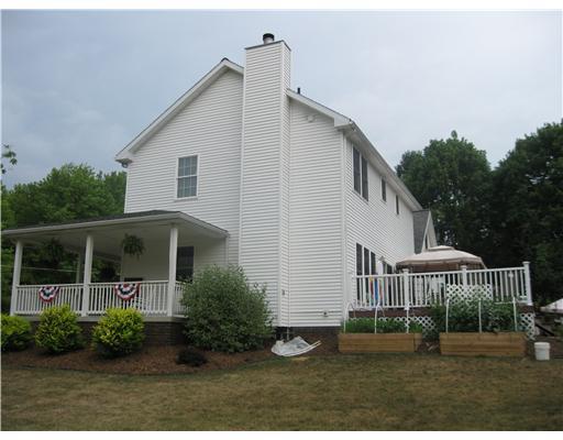 132 McCall Road Butler, PA 16001 - Photo 14 of 18 Other. Exterior side view, beautiful wrap porch & large back deck w/ trex flooring.
