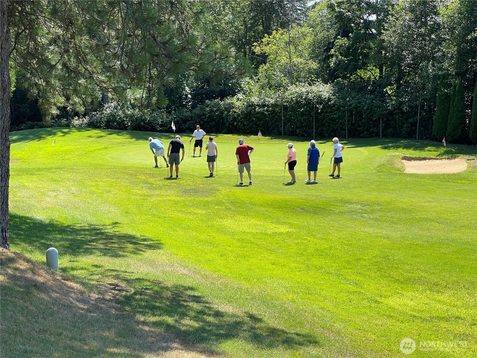 2101 South 324th Street, Unit 21 Federal Way, WA 98003 - Photo 2 of 40 a view of a swimming pool with a yard