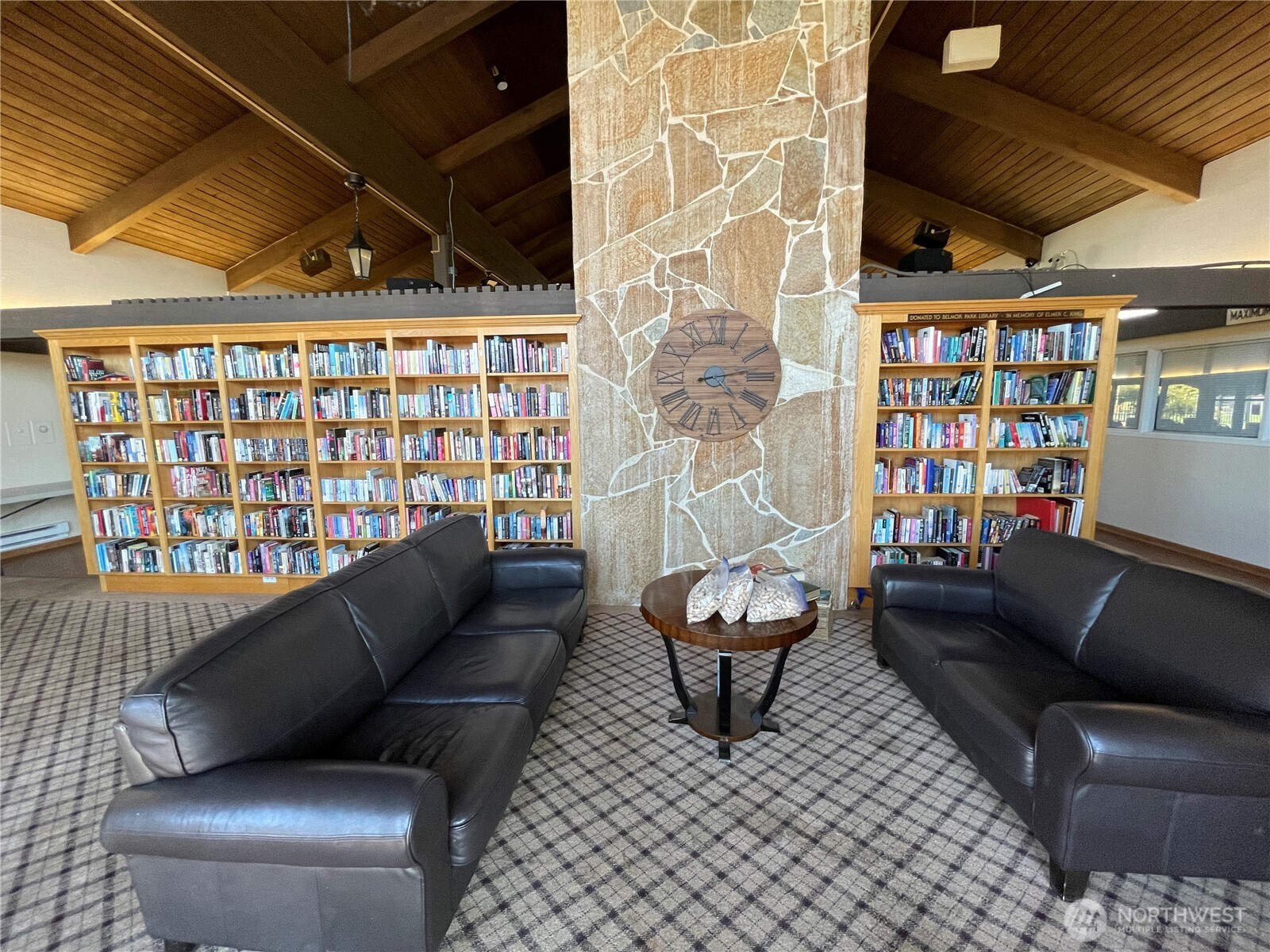 2101 South 324th Street, Unit 21 Federal Way, WA 98003 - Photo 32 of 40 a living room with furniture and a wooden floor