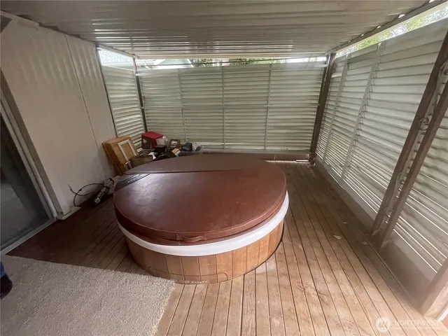 a view of a backyard with sitting area and furniture