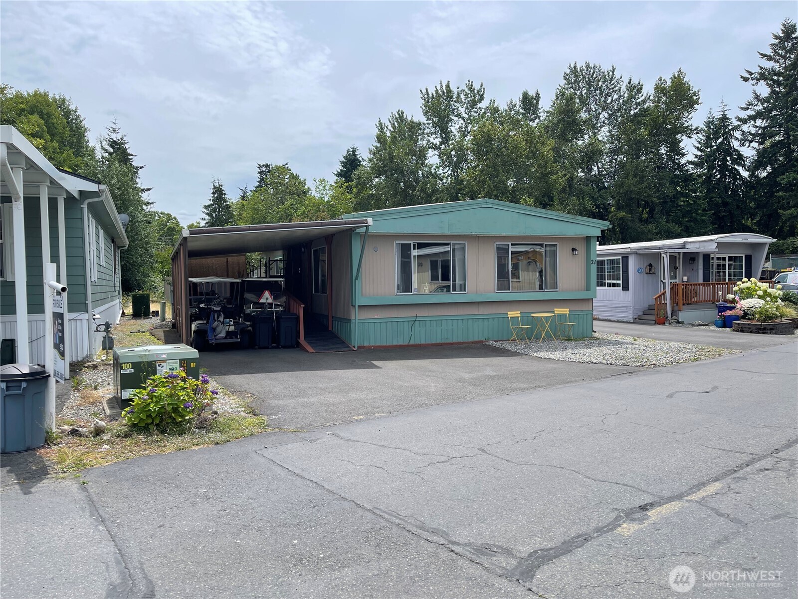 2101 South 324th Street, Unit 21 Federal Way, WA 98003 - Photo 39 of 39 a view of house with outdoor space and swimming pool