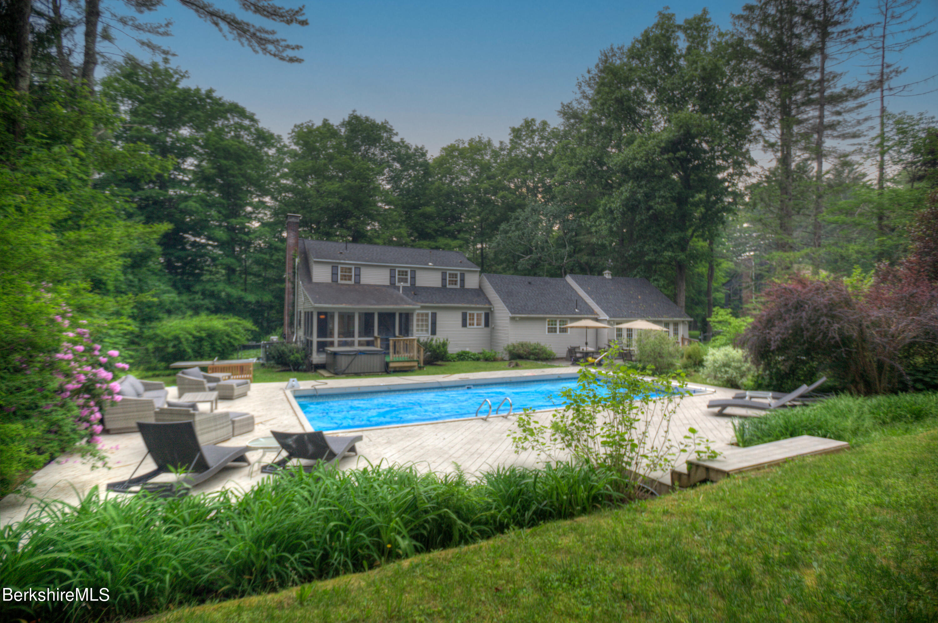 7 Hawthorne Road Stockbridge, MA 01262 - Photo 1 of 41 an aerial view of a house with swimming pool garden view and trees