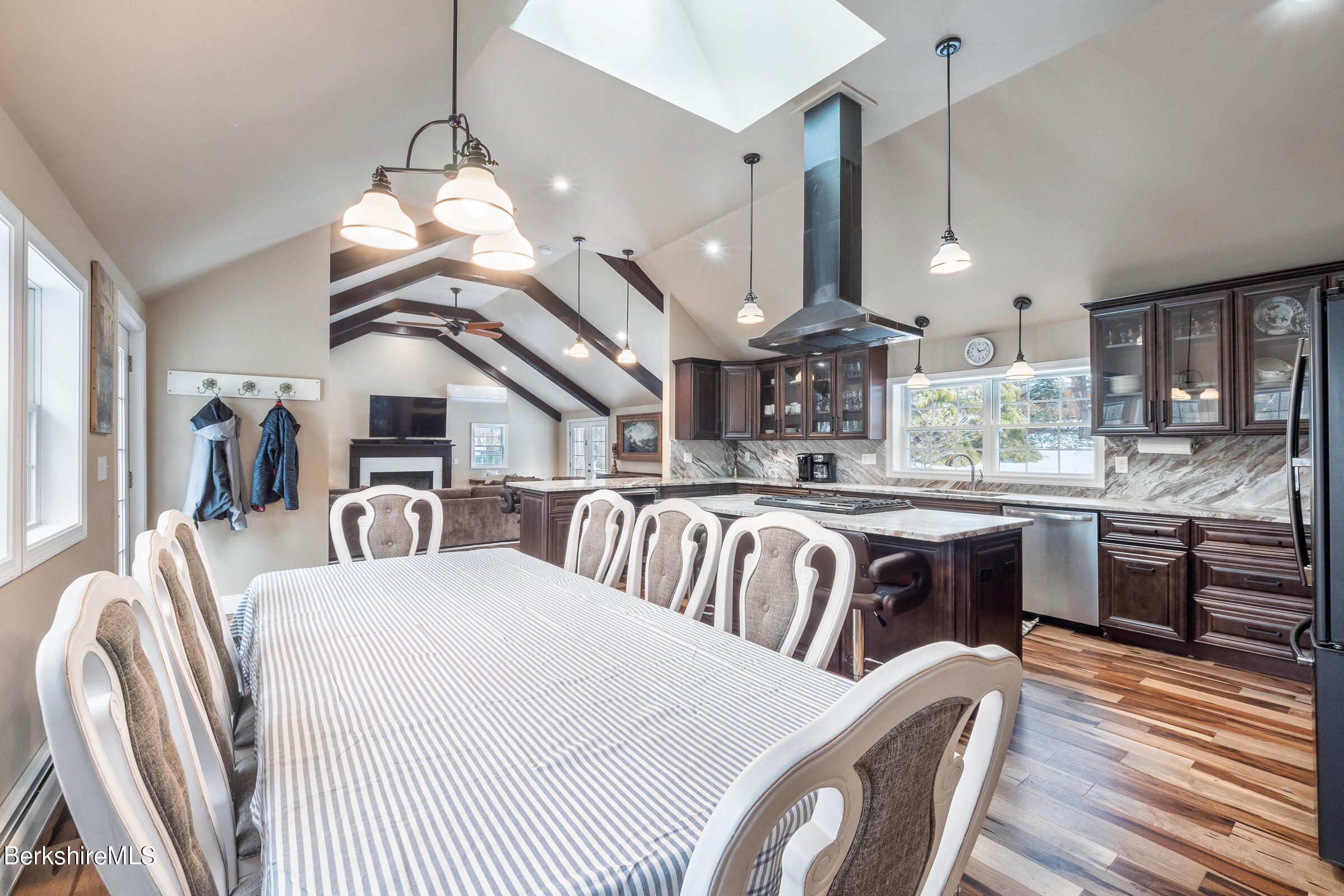 7 Hawthorne Road Stockbridge, MA 01262 - Photo 16 of 41 a large kitchen with a table and chairs