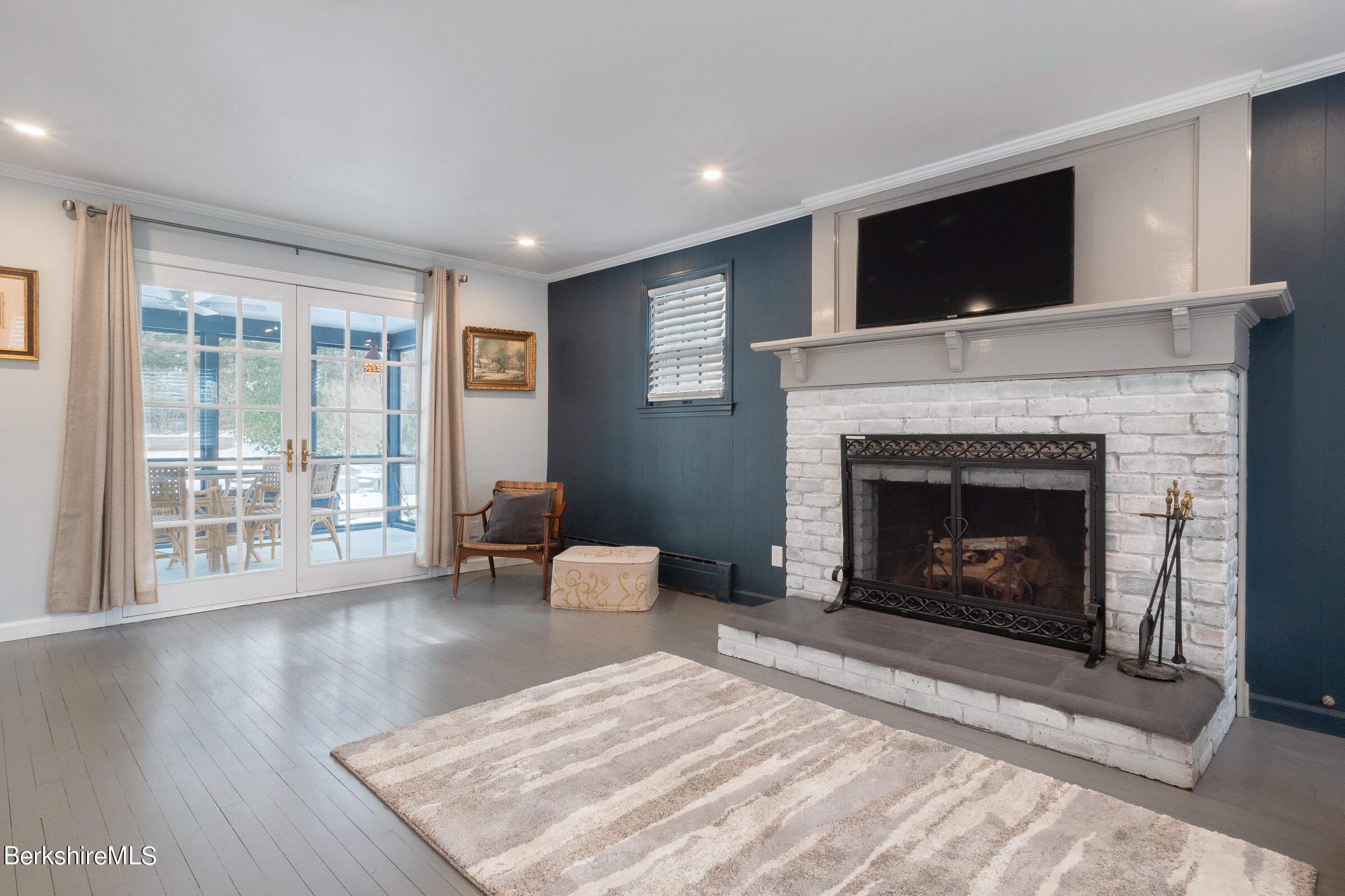 7 Hawthorne Road Stockbridge, MA 01262 - Photo 21 of 41 a living room with furniture and a fireplace