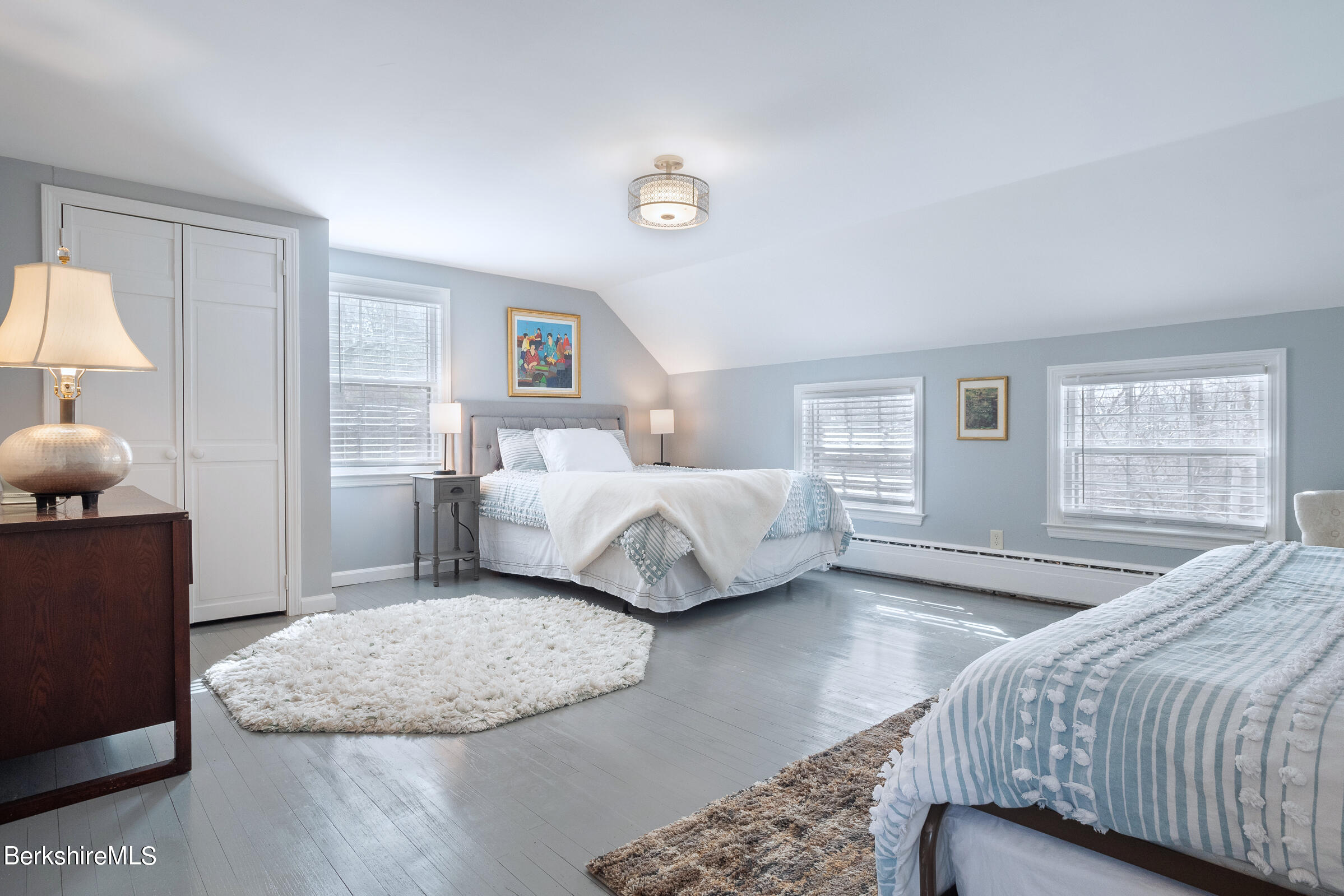 7 Hawthorne Road Stockbridge, MA 01262 - Photo 34 of 41 a bedroom with a bed and wooden floor