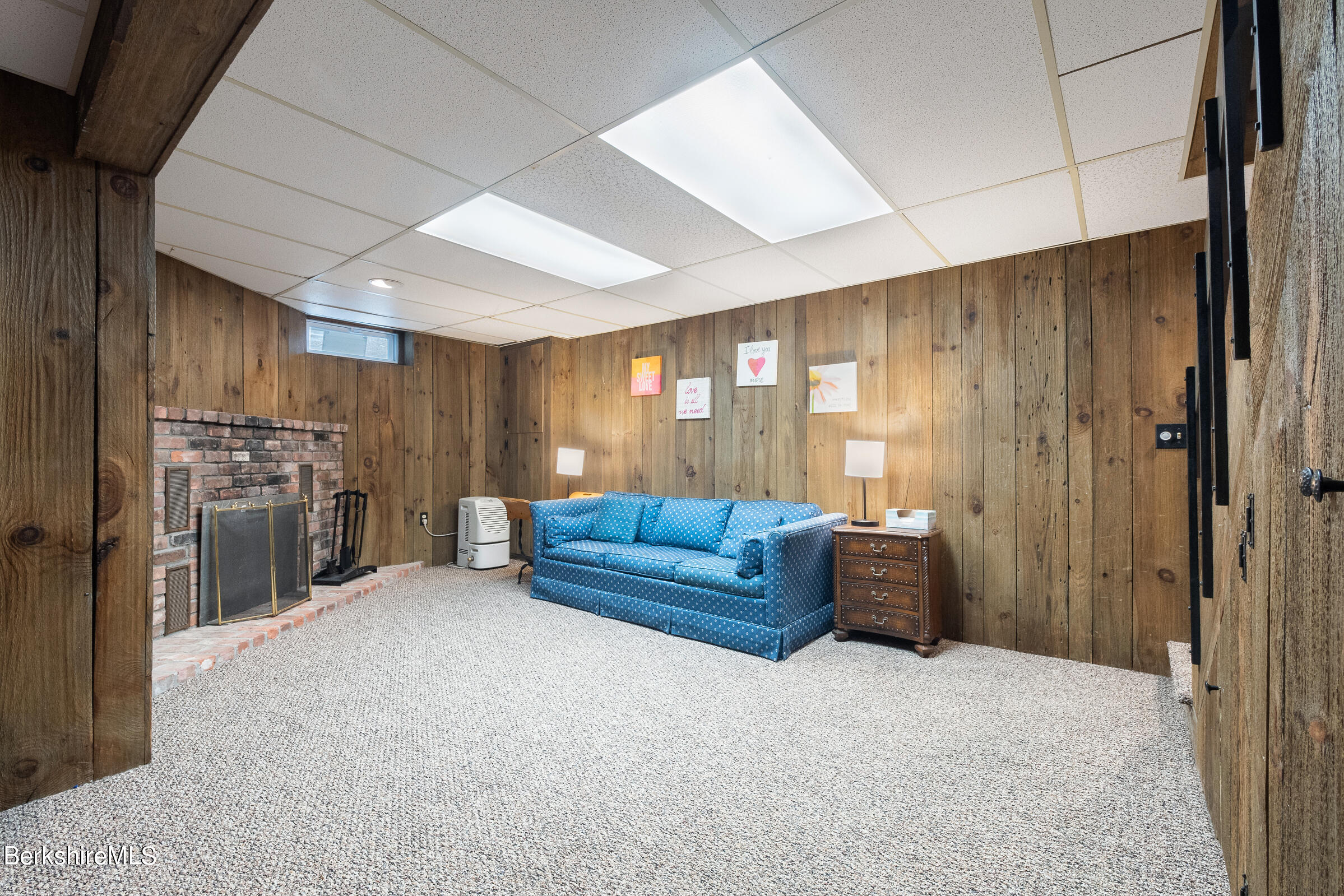 7 Hawthorne Road Stockbridge, MA 01262 - Photo 37 of 41 a bedroom with furniture and a refrigerator