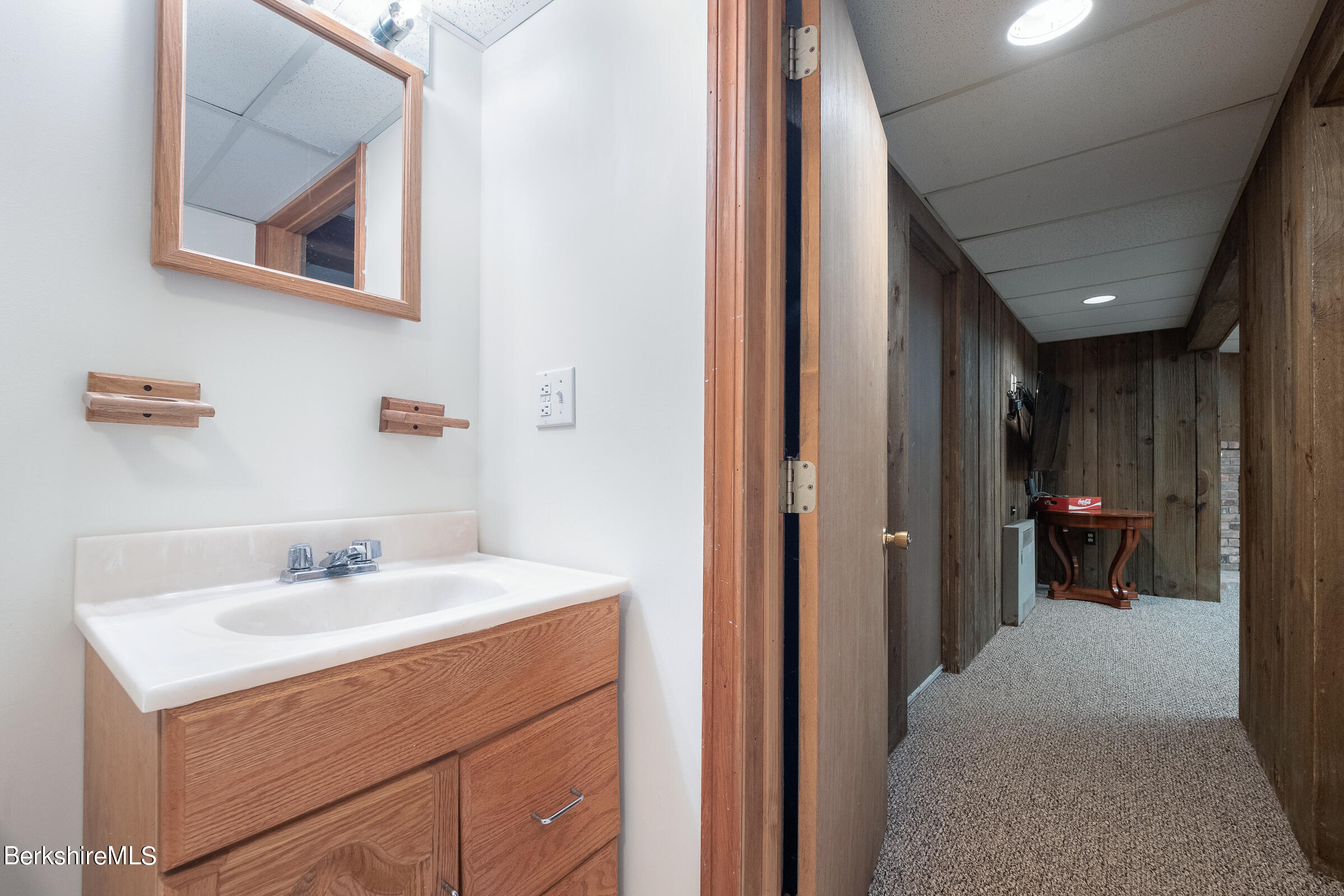 7 Hawthorne Road Stockbridge, MA 01262 - Photo 39 of 41 a bathroom with a sink and a mirror