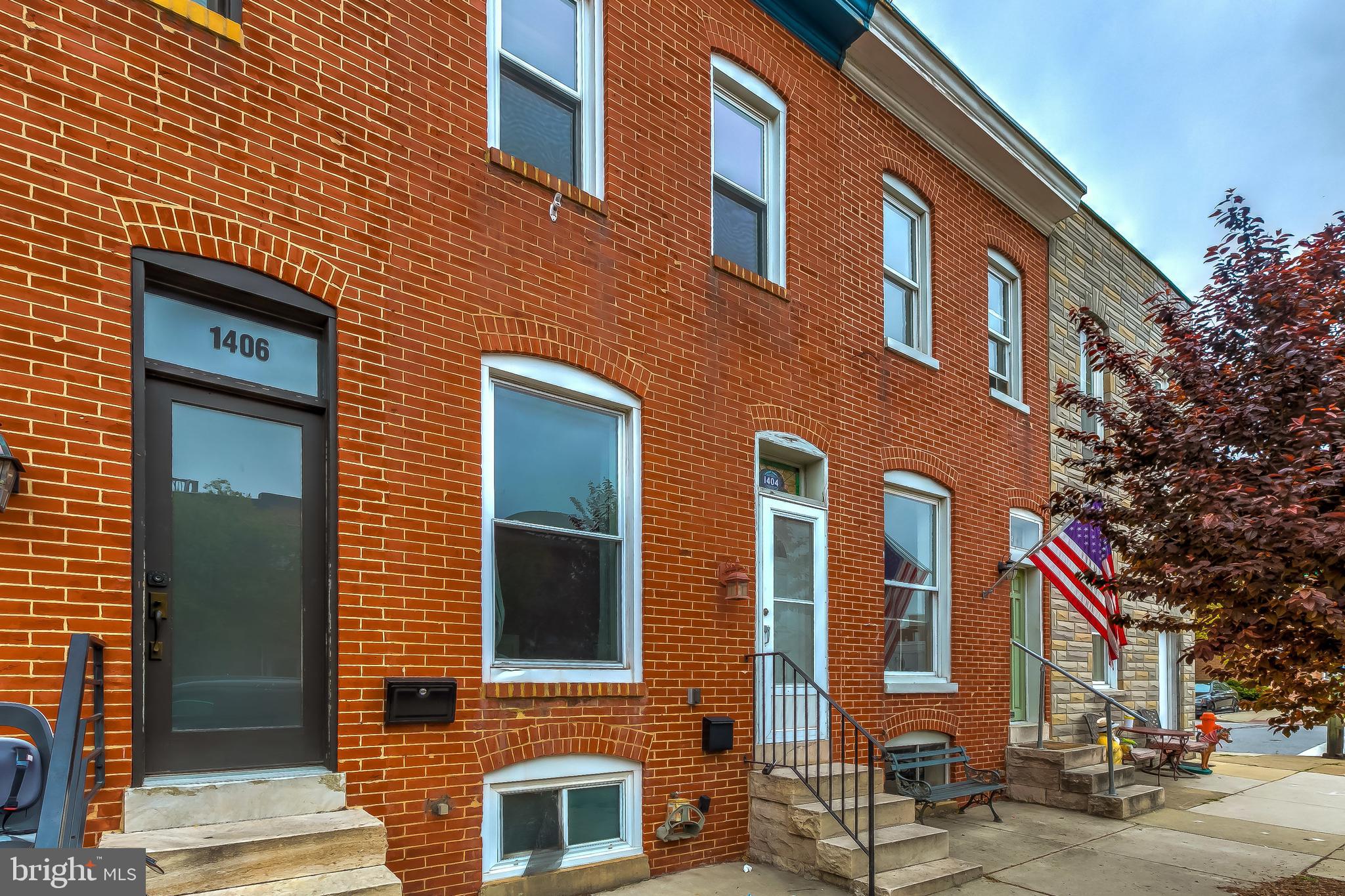 a front view of a building with a street