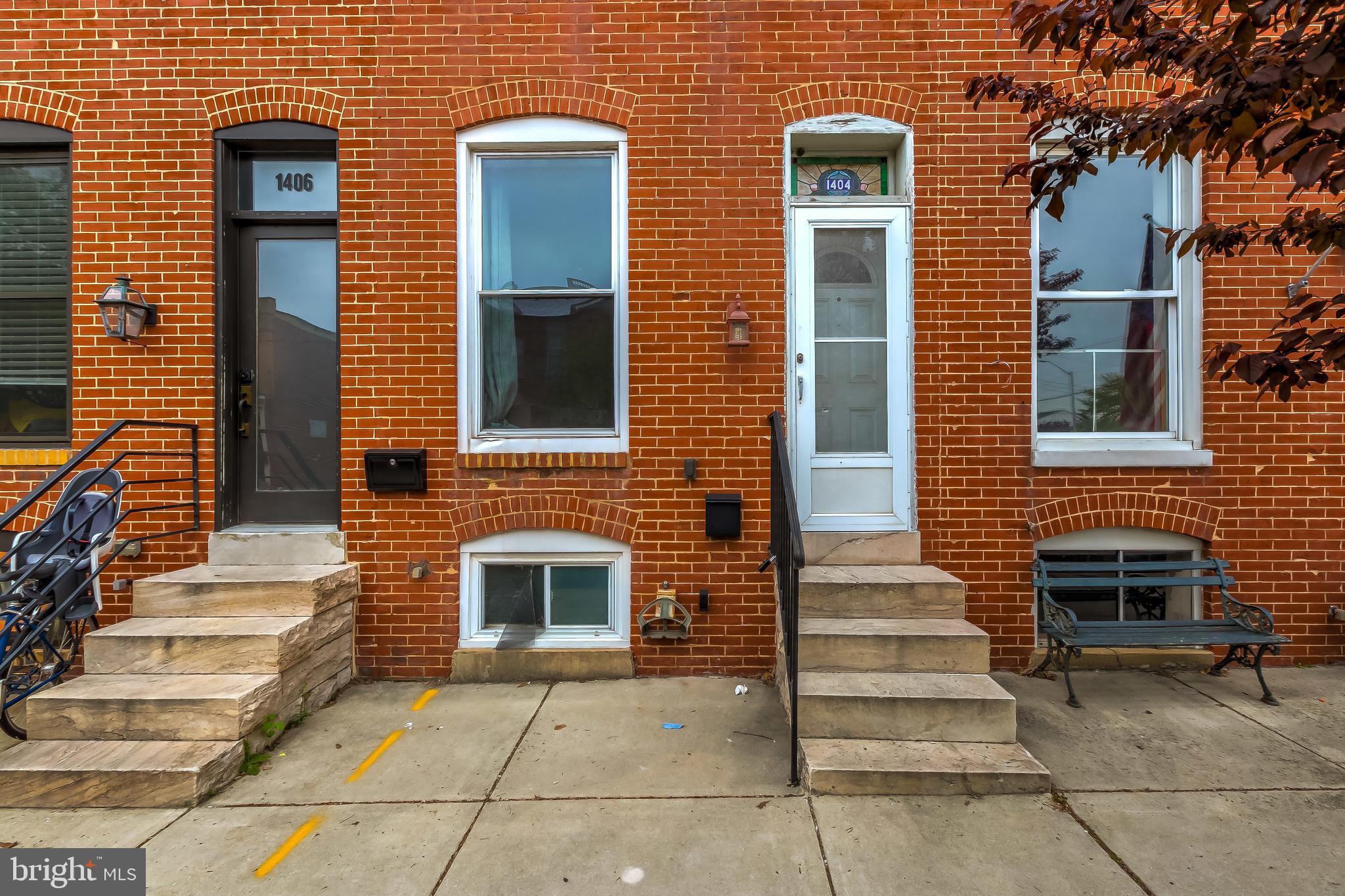 1404 Decatur Street Baltimore, MD 21230 - Photo 2 of 29 a front view of a house with stairs