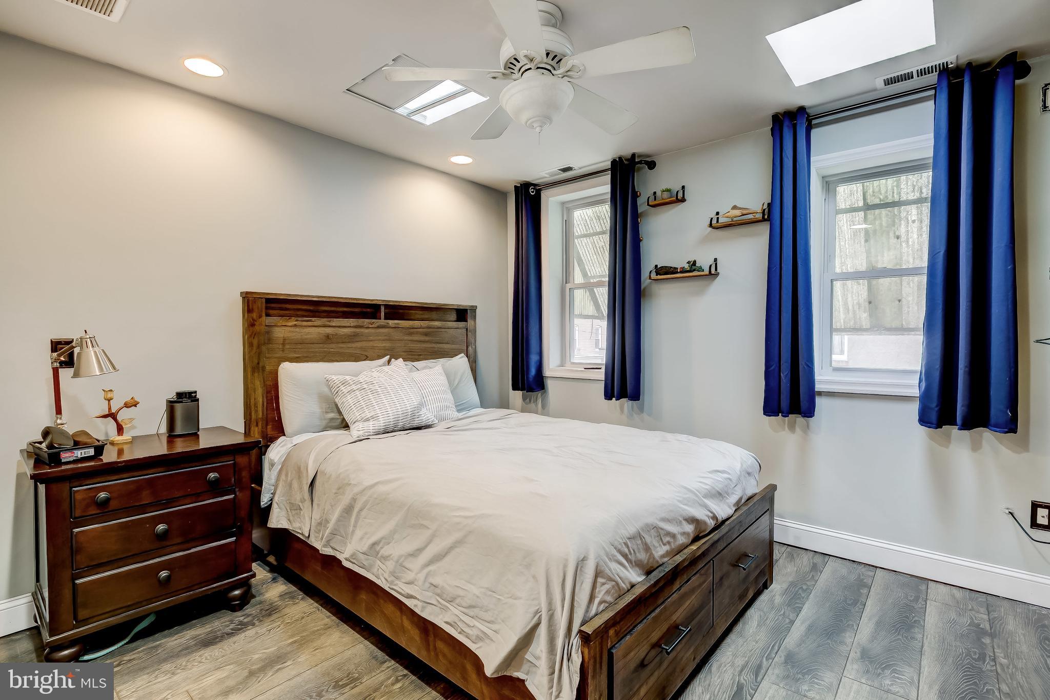 1404 Decatur Street Baltimore, MD 21230 - Photo 15 of 29 a bedroom with a bed and a window