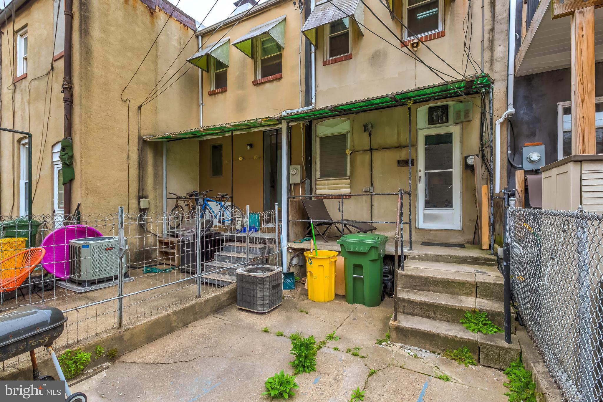 1404 Decatur Street Baltimore, MD 21230 - Photo 26 of 29 a front view of a building with outdoor seating