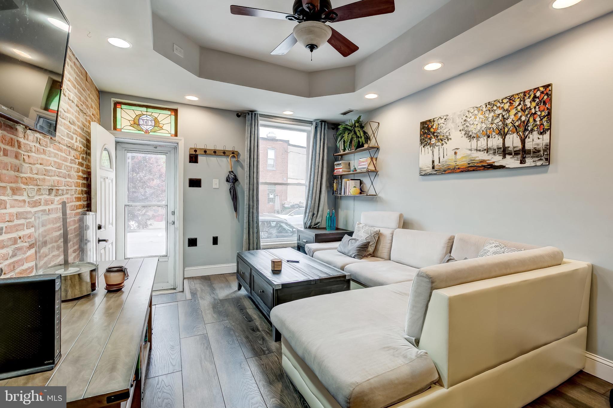 1404 Decatur Street Baltimore, MD 21230 - Photo 4 of 29 a living room with furniture and wooden floor