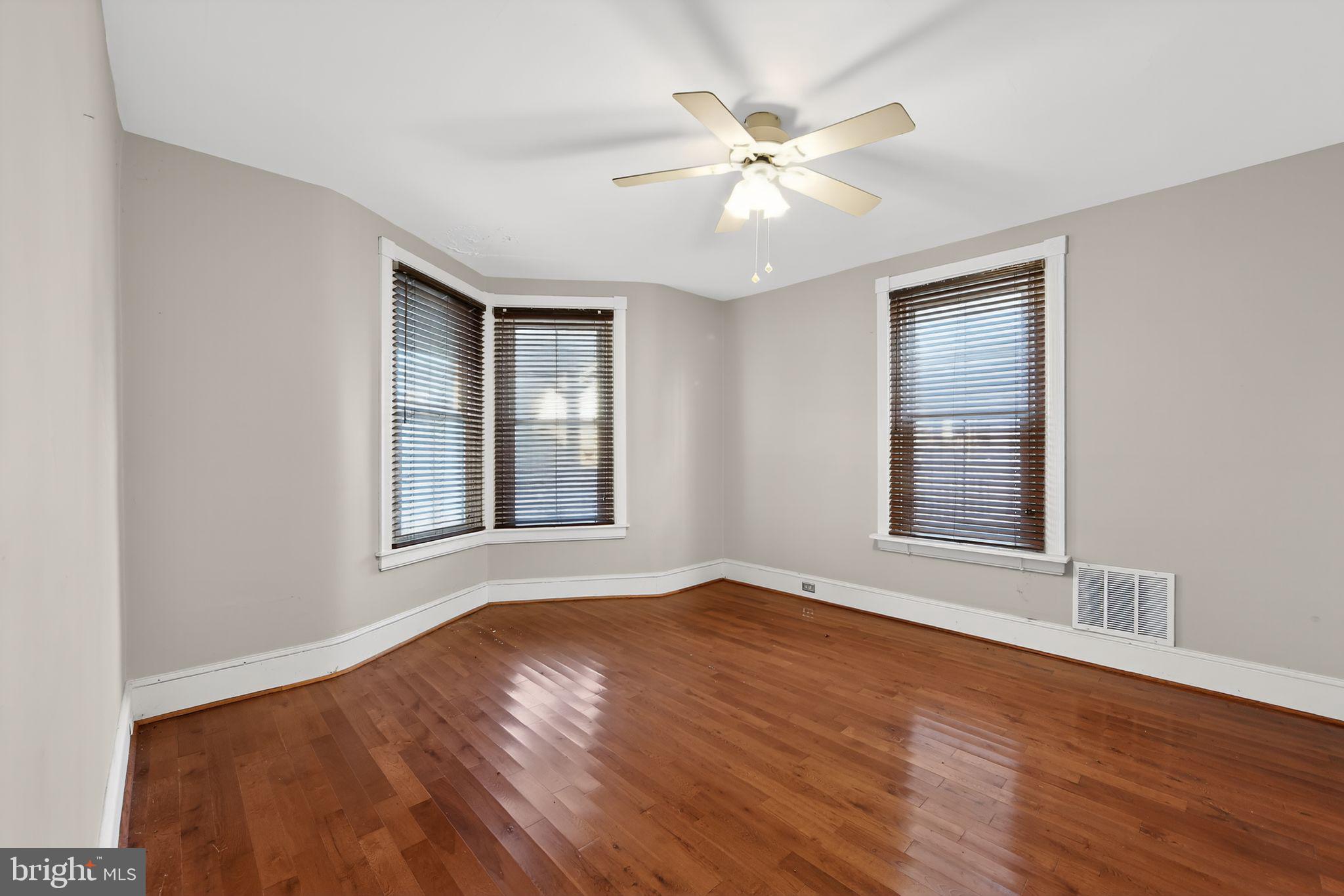 26 Waterloo Avenue Berwyn, PA 19312 - Photo 13 of 31 a view of an empty room with wooden floor and a window