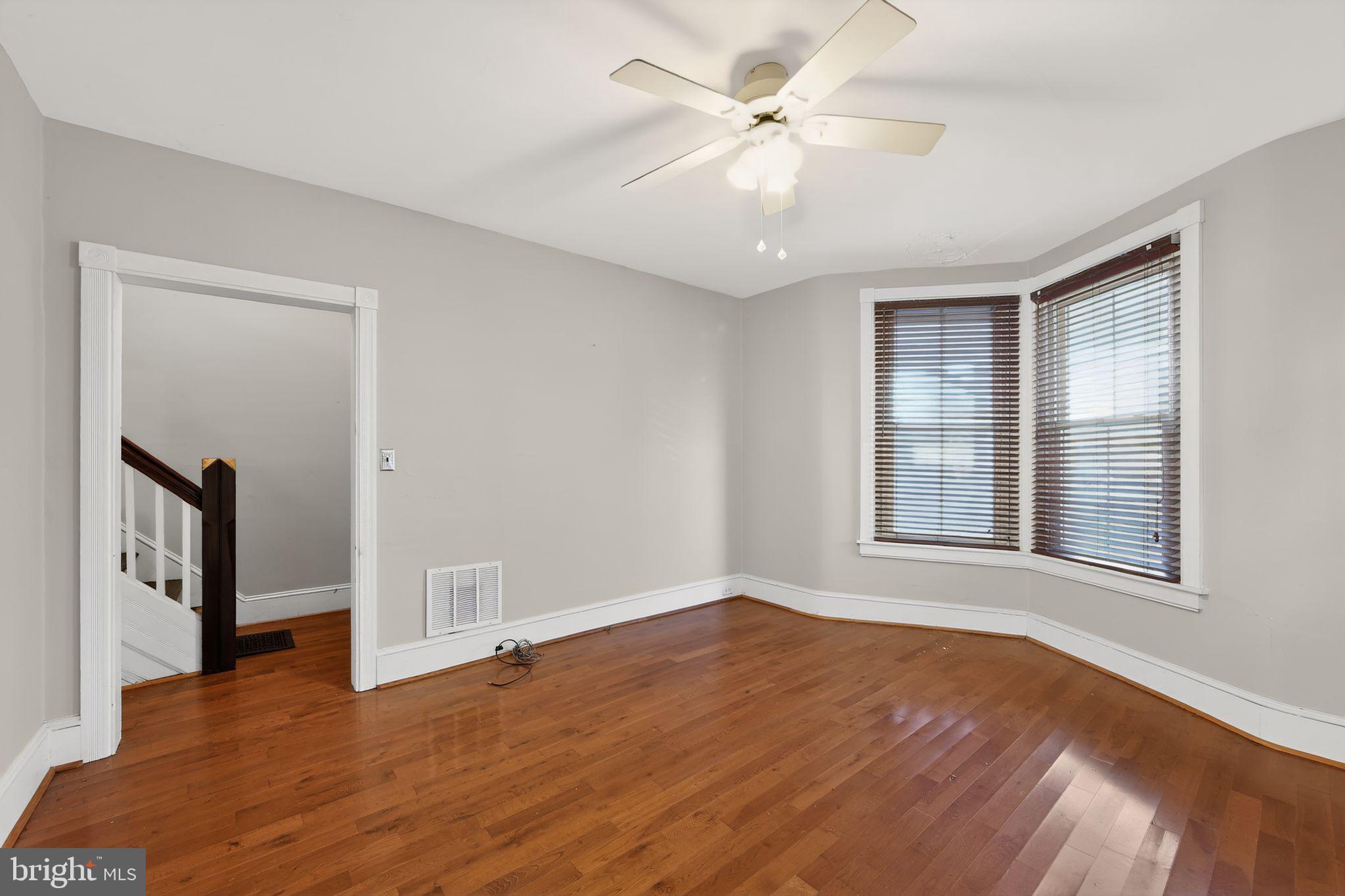 26 Waterloo Avenue Berwyn, PA 19312 - Photo 15 of 31 a view of an empty room with a window and wooden floor