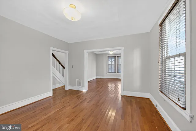 a view of livingroom with hardwood floor and window