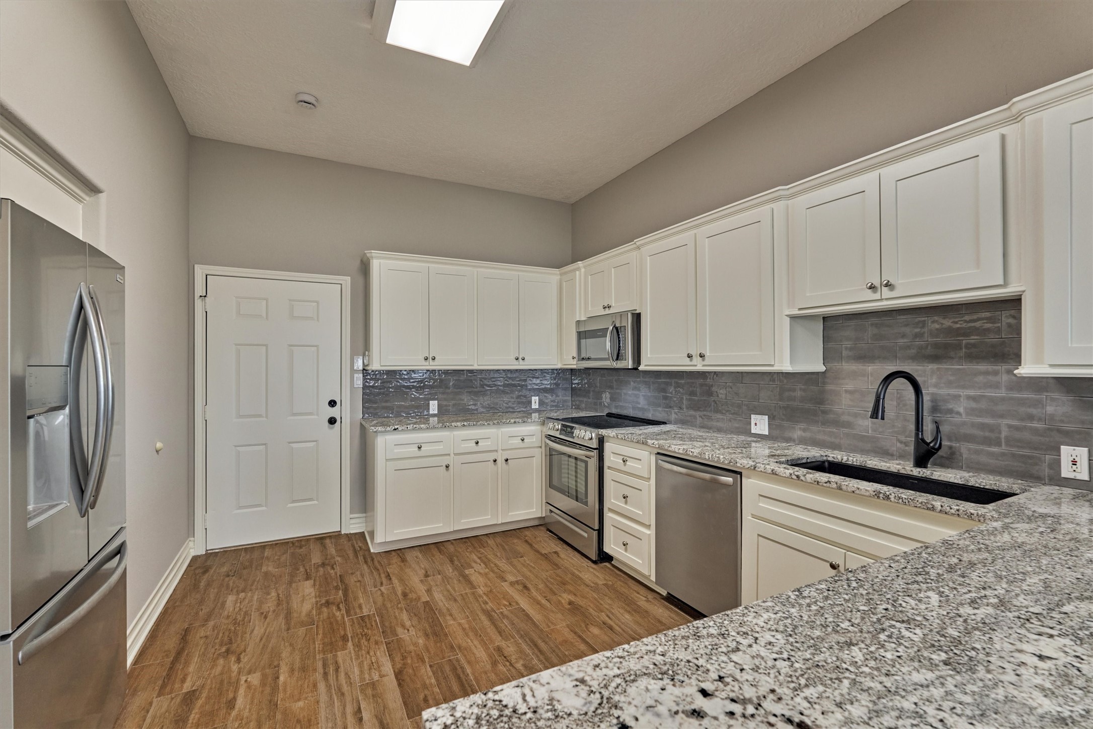 4 Regency Point Montgomery, TX 77356 - Photo 17 of 47 Stainless appliance package with fridge included.