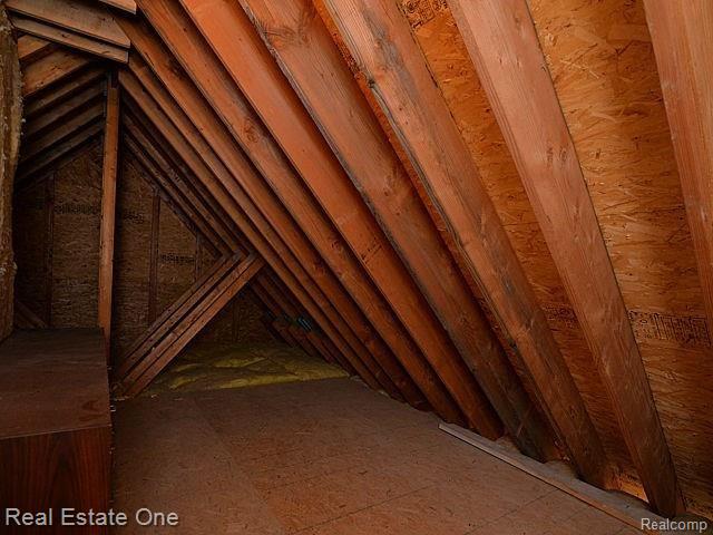 3352 Brighton Road Howell, MI 48843 - Photo 47 of 56 one of two attic storage areas from bedrooms