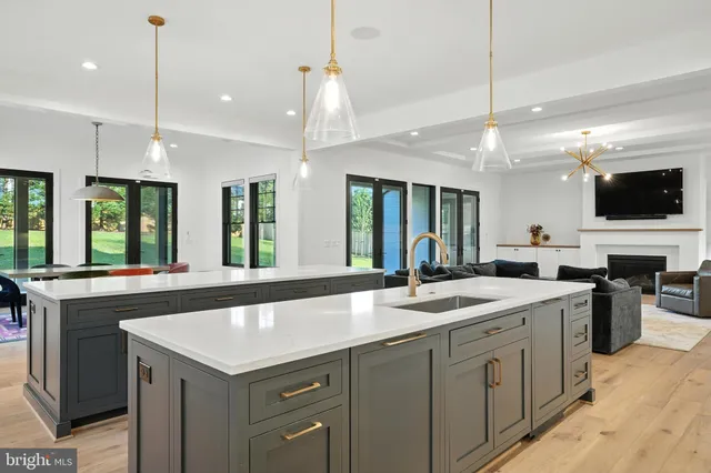 a bathroom with a sink toilet and mirror
