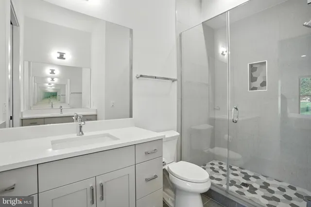 a living room with furniture or couch and a flat screen tv