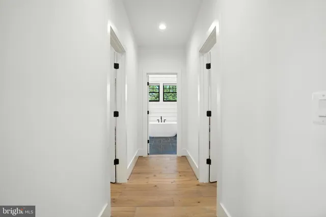 a living room with furniture fireplace and flat screen tv
