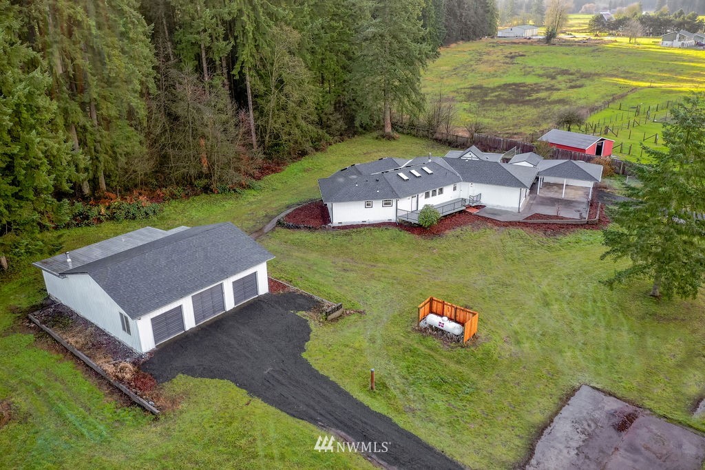12425 Highway 12 Rochester, WA 98579 - Photo 1 of 29 a view of a house with a yard