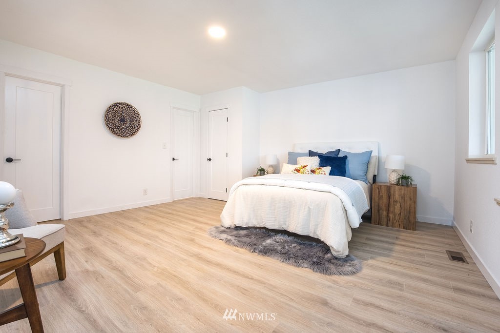 12425 Highway 12 Rochester, WA 98579 - Photo 15 of 29 a bedroom with a bed and window
