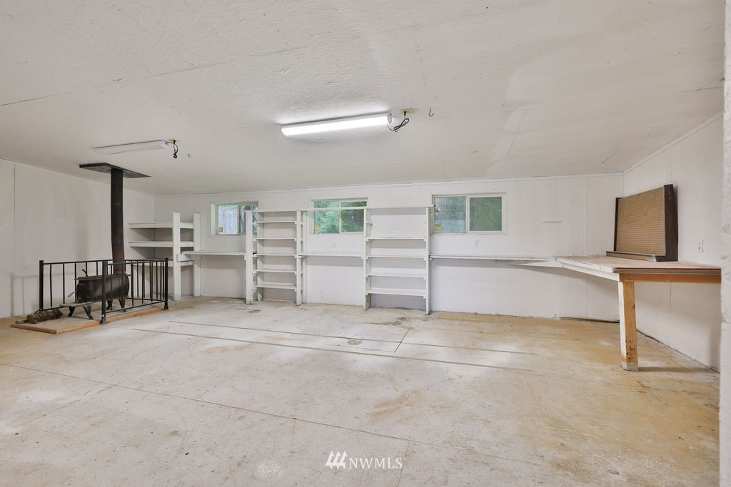 12425 Highway 12 Rochester, WA 98579 - Photo 28 of 29 a view of an empty room with a cabinet