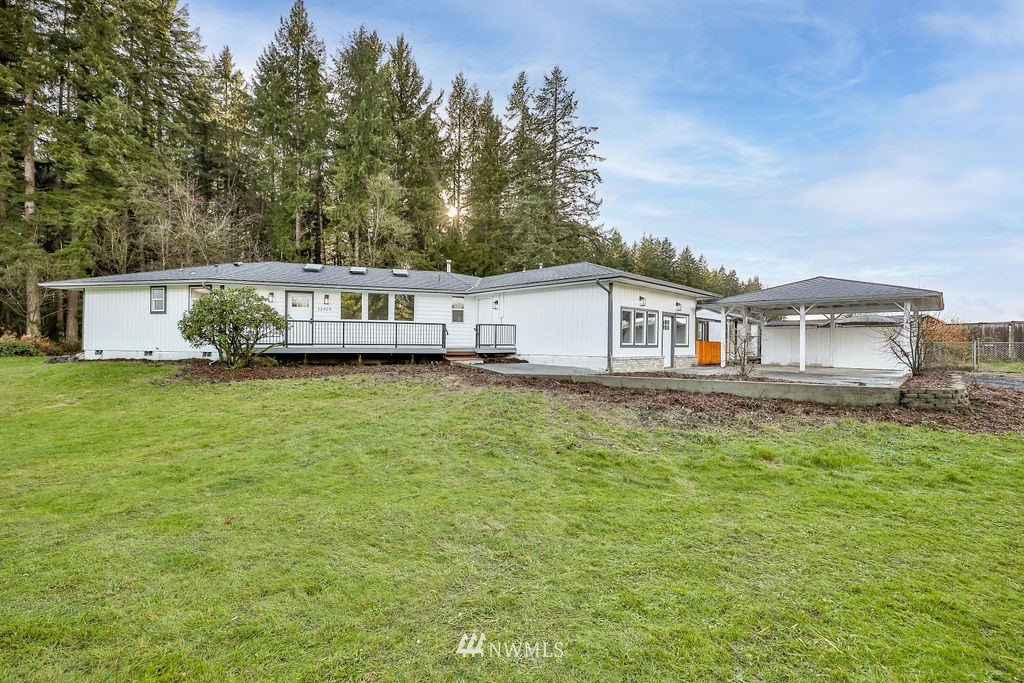 12425 Highway 12 Rochester, WA 98579 - Photo 3 of 29 a view of a house with a big yard