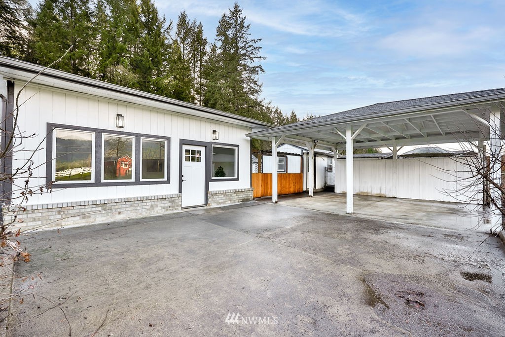 12425 Highway 12 Rochester, WA 98579 - Photo 4 of 29 a view of a house with a garage