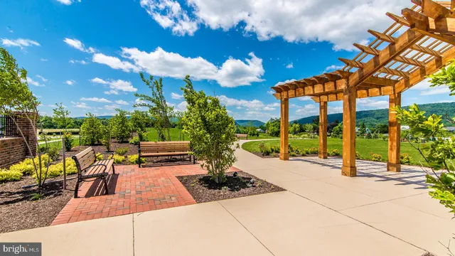 a view of a patio with swimming pool
