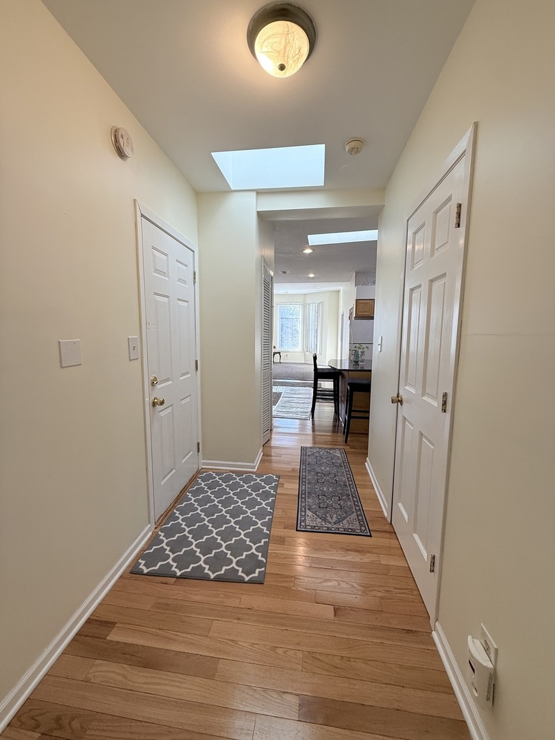 3643 South Hamilton Avenue, Unit 3 Chicago, IL 60609 - Photo 13 of 29 a view of livingroom with hardwood floor and furniture