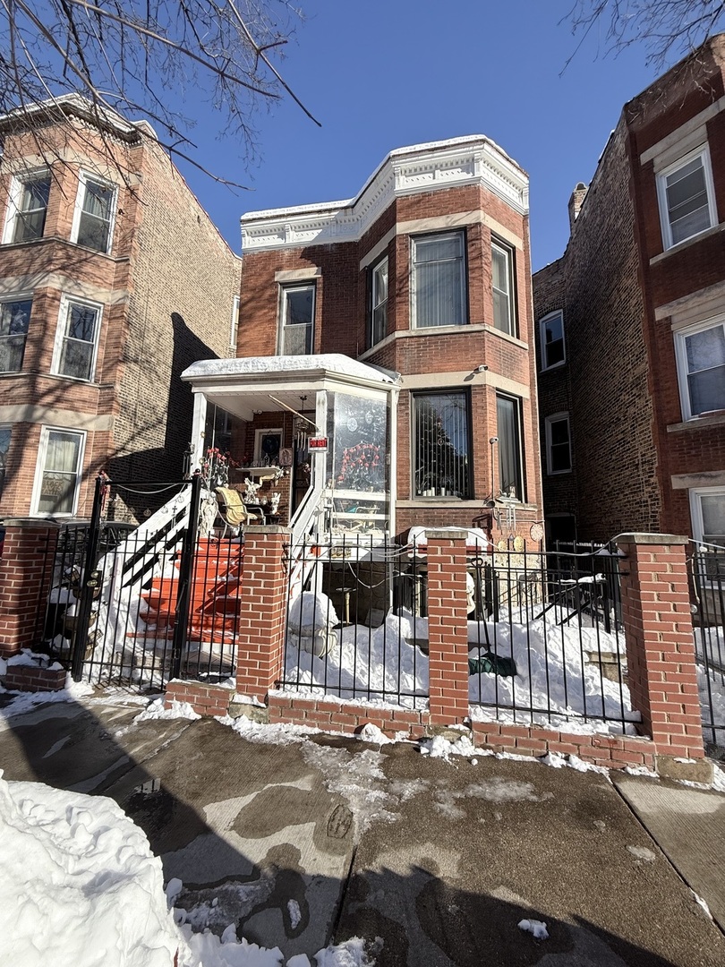 3643 South Hamilton Avenue, Unit 3 Chicago, IL 60609 - Photo 2 of 29 a front view of a building