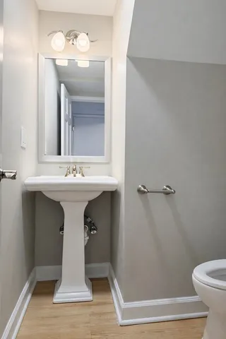 a bathroom with a sink and mirror