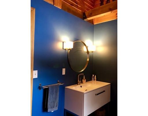 270 East Leverett Road Amherst, MA 01002 - Photo 12 of 30 a bathroom with a sink and a mirror