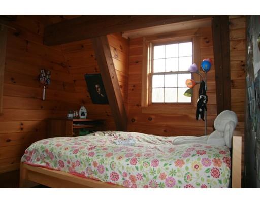 270 East Leverett Road Amherst, MA 01002 - Photo 22 of 30 a bedroom with a bed and a window