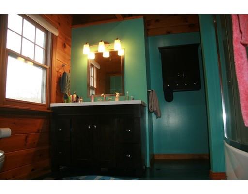 270 East Leverett Road Amherst, MA 01002 - Photo 23 of 30 a bathroom with a sink and a mirror