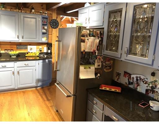 270 East Leverett Road Amherst, MA 01002 - Photo 10 of 30 a kitchen with a refrigerator and a stove