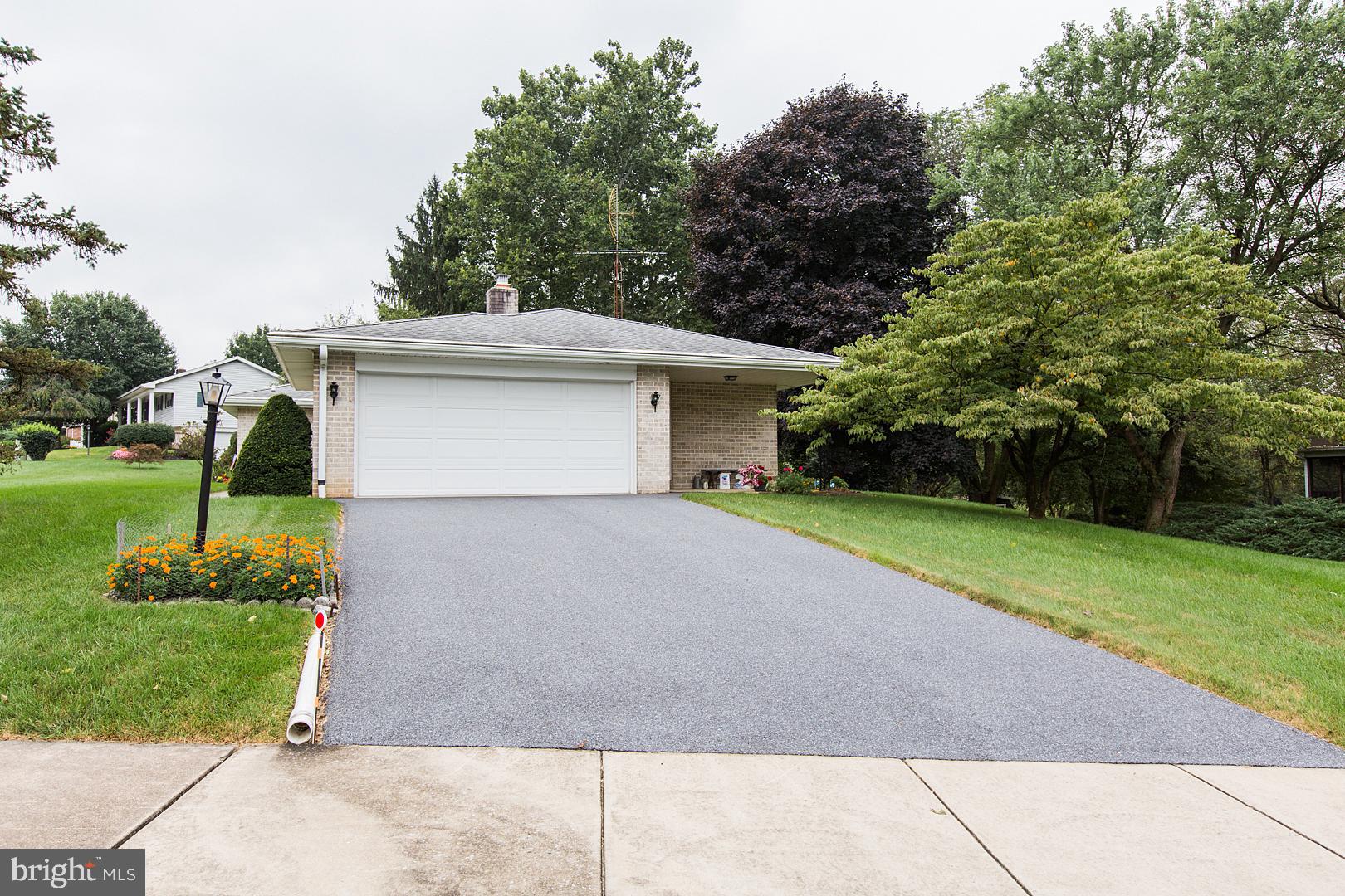 38 Heritage Road Akron, PA 17501 - Photo 4 of 38 Side Load 2 Car Garage w/ resurfaced driveway