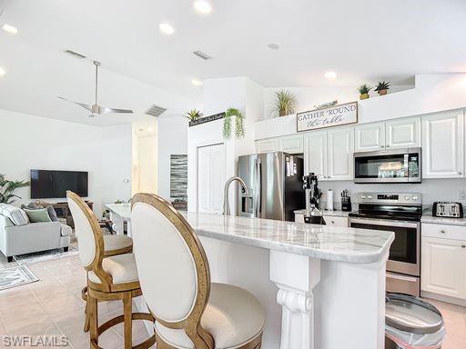 8452 Indian Wells Way Naples, FL 34113 - Photo 11 of 44 Kitchen open to great Room
