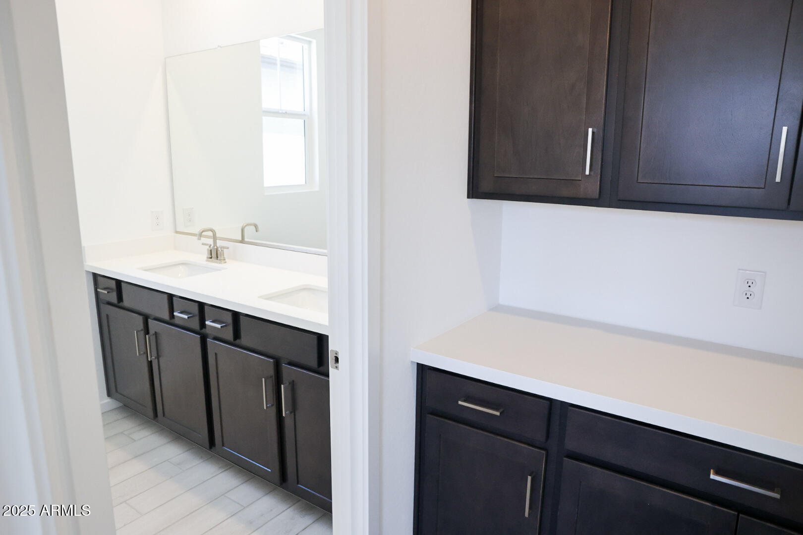 2460 West Rowel Road Phoenix, AZ 85085 - Photo 12 of 25 a bathroom with a sink and a mirror