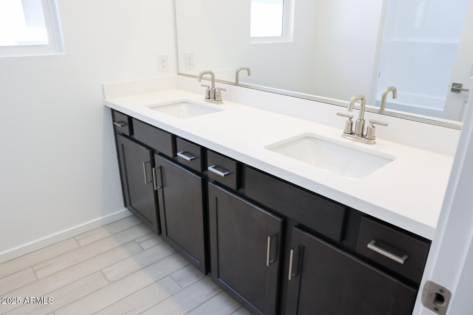 2460 West Rowel Road Phoenix, AZ 85085 - Photo 13 of 25 a bathroom with a sink double vanity and a mirror