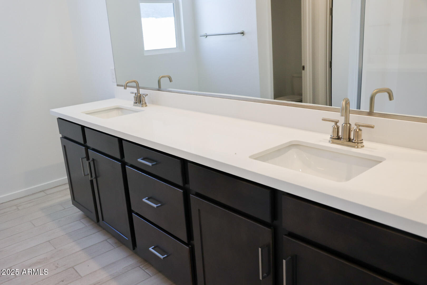 2460 West Rowel Road Phoenix, AZ 85085 - Photo 9 of 25 a bathroom with a sink double vanity and a mirror