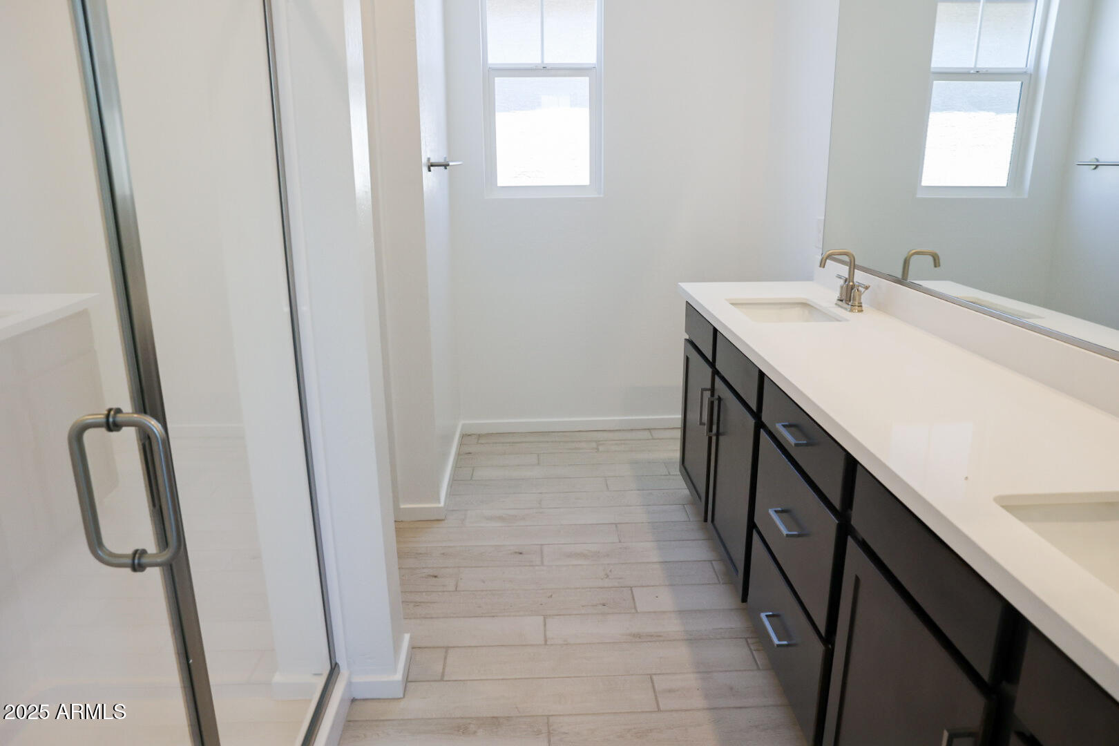 2460 West Rowel Road Phoenix, AZ 85085 - Photo 10 of 25 a bathroom with sink and mirror