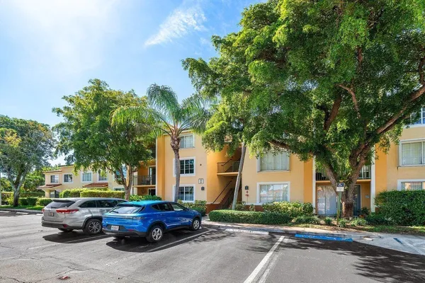 a view of a swimming pool and lounge chair