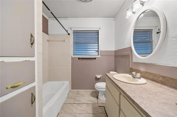 a view of hallway with wooden floor