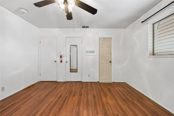 a view of an entryway with hardwood