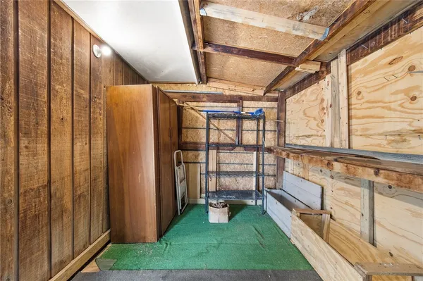 a view of a backyard with sitting area